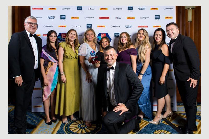 Insight's Benefits - Man holding award