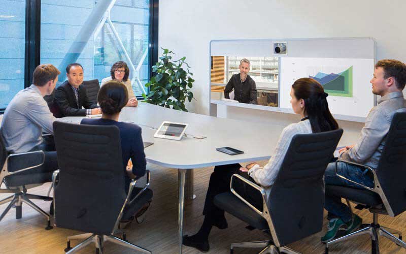 Team meeting taking place with video conferencing