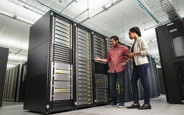HPE optimized servers Two professionals in server room