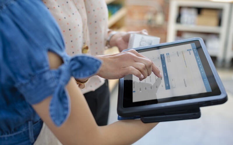 Superior reliability for workplace collaboration HP Pro x2 being used by colleagues for a meeting