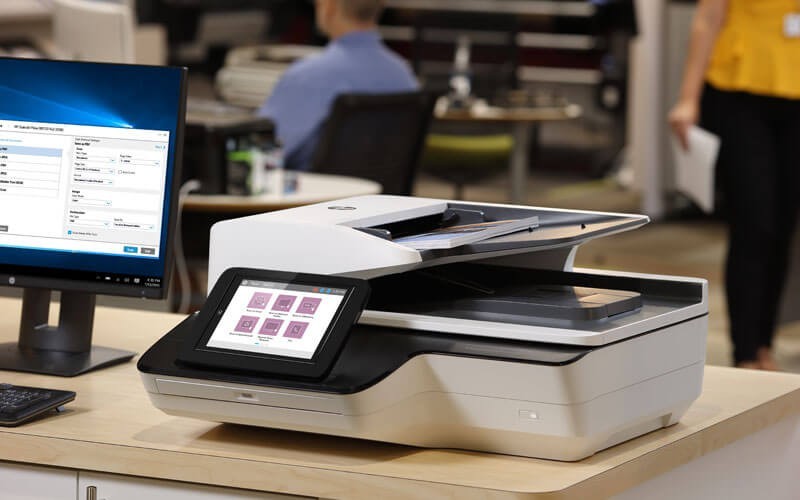 HP digital scanners HP Scanjet Enterprise on desk in office
