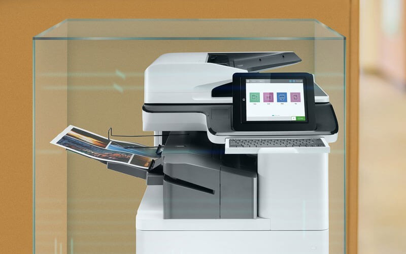 Protect every printer HP Colour LaserJet Pro MFP M377dw on a cart in an office.