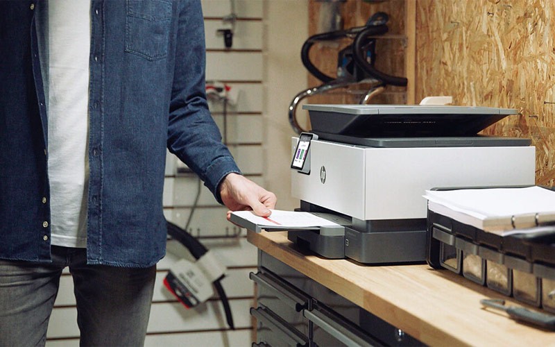 Get work done wherever, whenever Man collecting printed forms from the tray