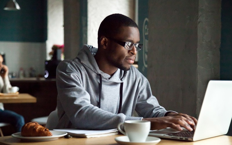 Remote working solutions Man working at a desk