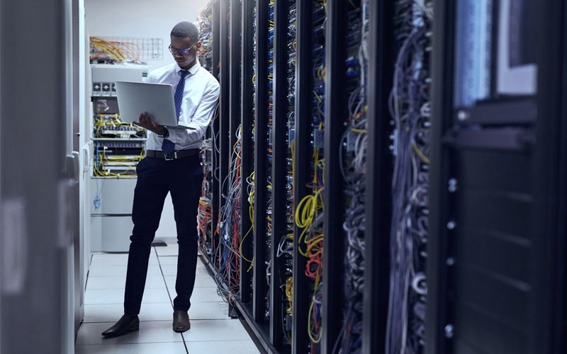Virtualization to storage Man in server room