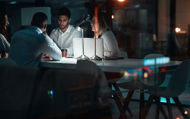 VMware hyperconverged solutions Group of employees working together at night