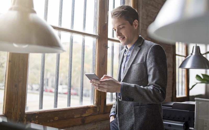 VMware Workspace ONE App Express Business man using mobile phone
