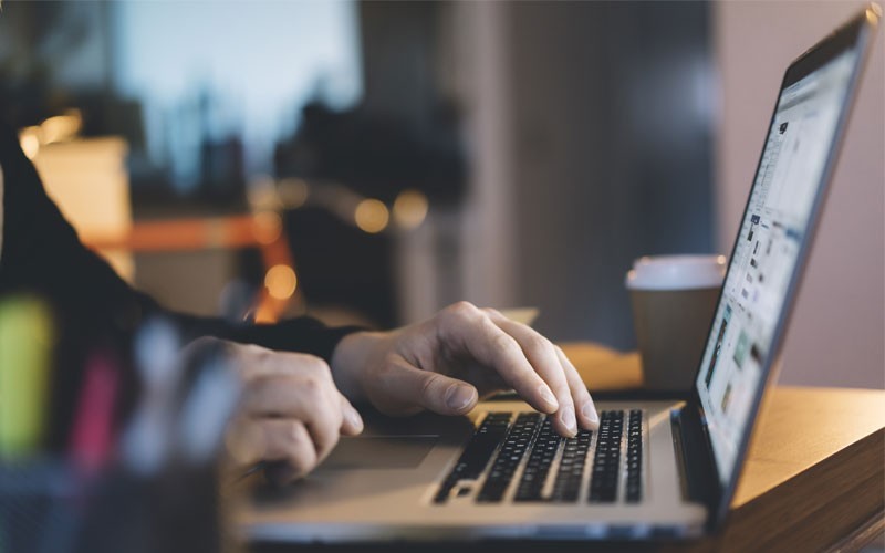 VMware AppDefense protects all applications User typing on laptop keyboard