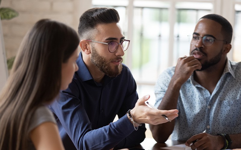 Explore our Microsoft 365 Health Check Group of colleagues during a workshop